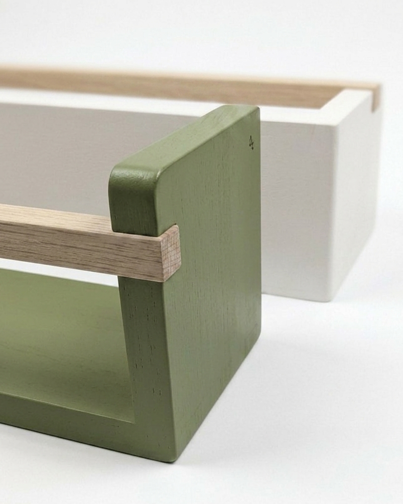 Green and beige wooden shelf on a white background